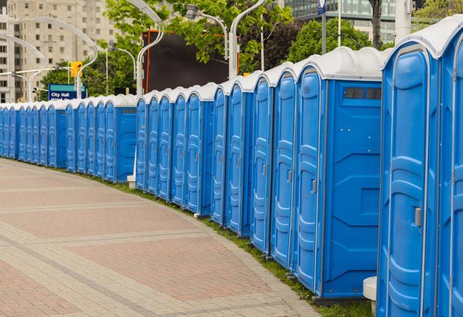 a row of portable restrooms at a fairground, offering visitors a clean and hassle-free experience in springfield